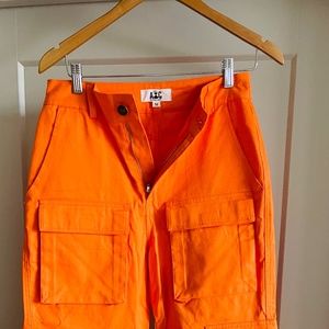 Neon orange cargo pants